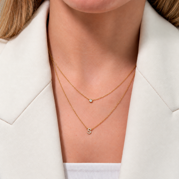 Koljė su raide "S" 0,06 ct