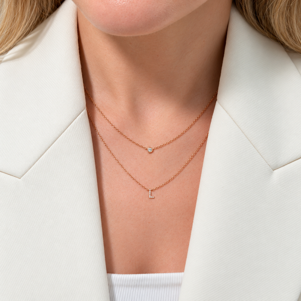 Koljė su raide "L" 0,05 ct